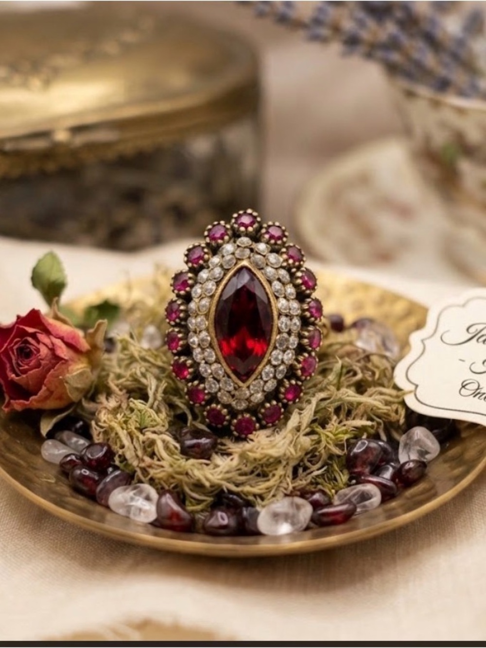 Gold-Tone Ring with Deep Red Marquise Gem and Ruby Accents